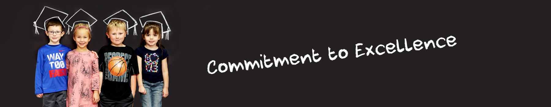 Children in front of Chalkboard